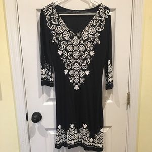 Black dress with white swirl design